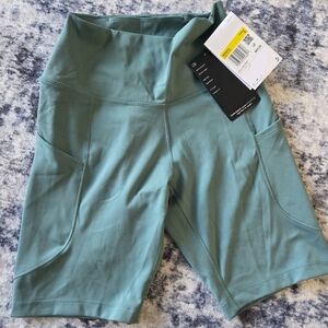 Nike One Women's High-Waisted 8" Biker Shorts with Pockets